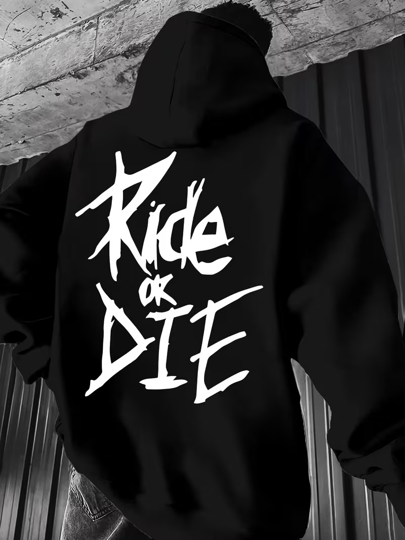 Black hoodie with 'Ride or Die' text on the back, worn by a person against a textured wall.