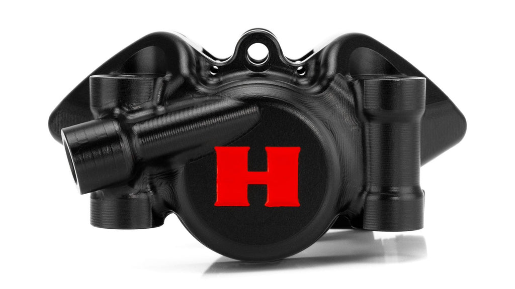 Black mechanical component with a red 'H' logo on a white background