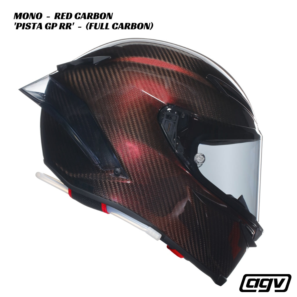 Carbon fiber motorcycle helmet with red accents on a white background, featuring the AGV brand.