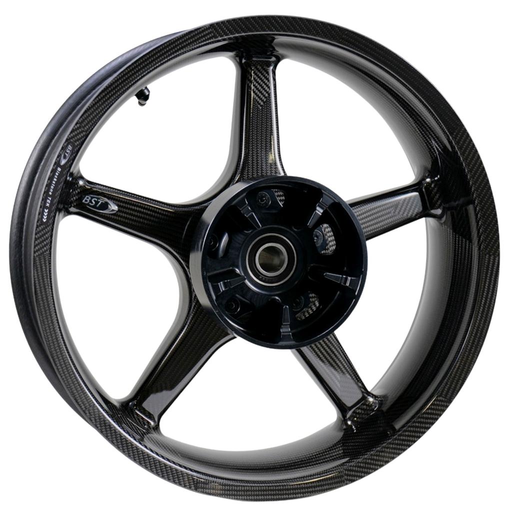 Black motorcycle wheel on a white background