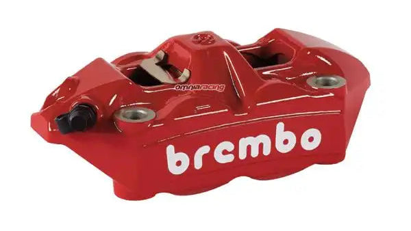 Red brembo brake caliper on a white background