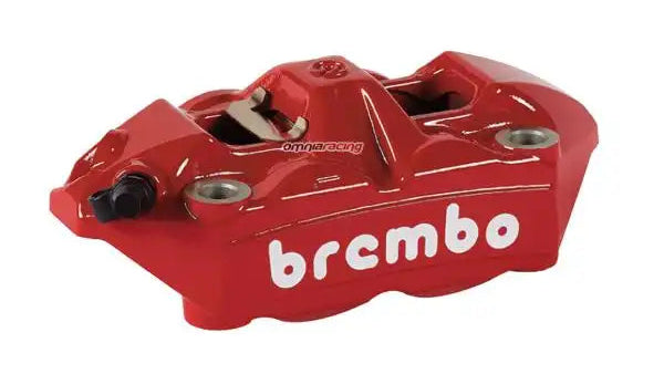 Red brembo brake caliper on a white background