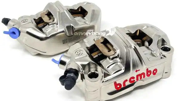 Brembo brake calipers on a white background with Brembo logo.