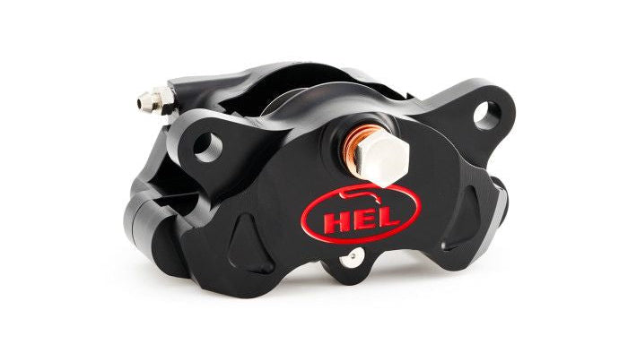 Black brake caliper with red HEL logo on a white background