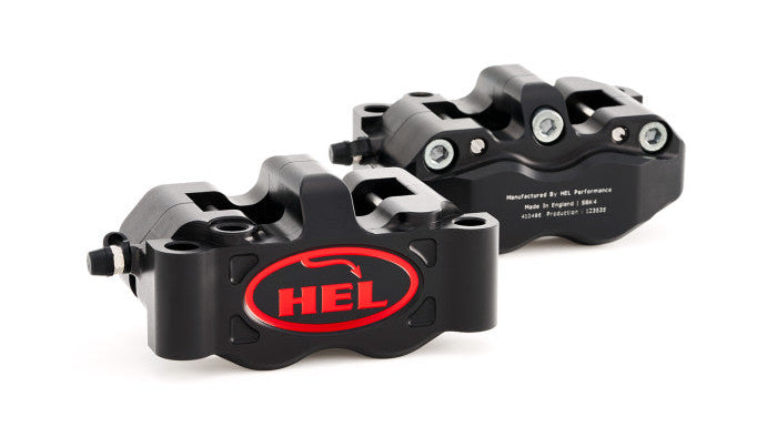 Two black brake calipers with a red 'HEL' logo on a white background