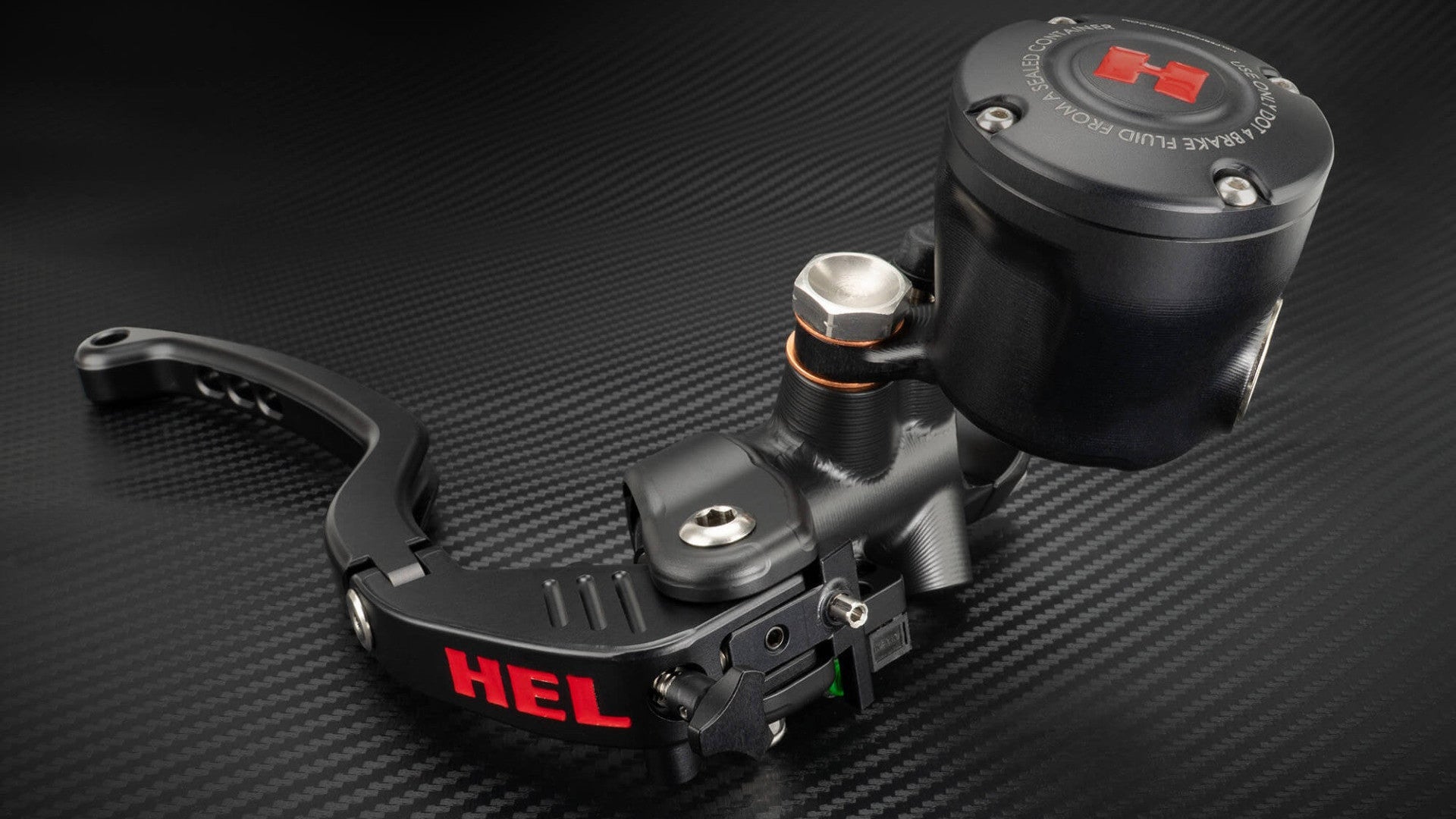 Black motorcycle clutch lever with 'HEL' branding on a carbon fiber background